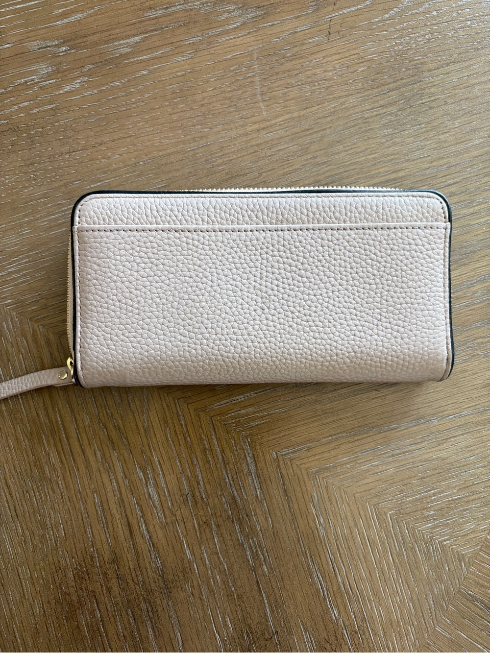 kate spade Blush Pebbled Leather Zip Wallet with Black Tassel